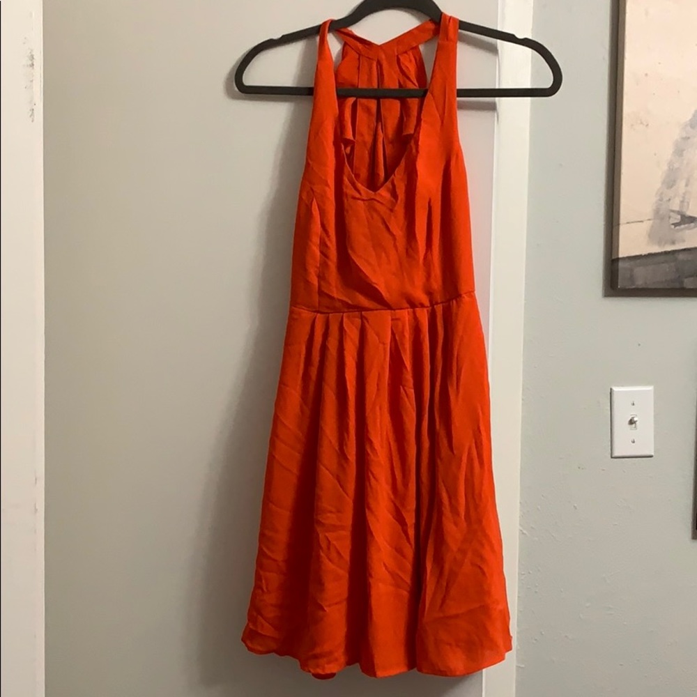 Orange/red skater dress with back ruffle detail